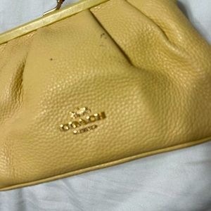 Small yellow coach purse